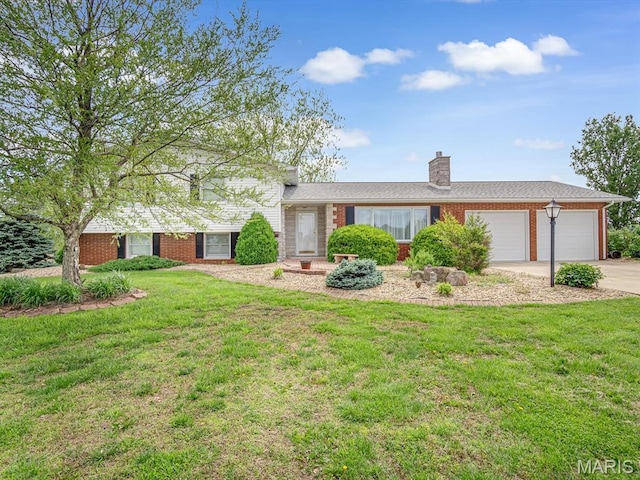 10804 Campbell Rd, Coulterville, IL 62237 - view of front of property with an attached garage, brick siding, driveway, and a front yard