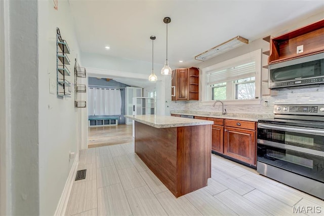 kitchen with appliances with stainless steel finishes, open shelves, decorative backsplash, a center island, and decorative light fixtures