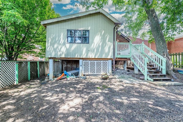 1723 Mccready Ave, Saint Louis, MO 63117 - back of property featuring stairs and a deck