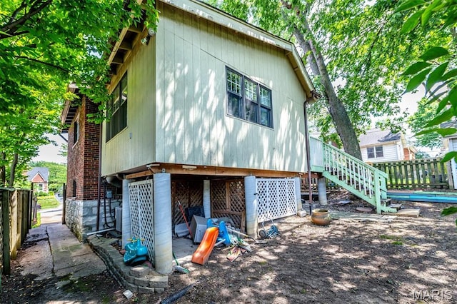 1723 Mccready Ave, Saint Louis, MO 63117 - rear view of house with stairs
