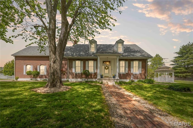 339 E Ml, Millstadt, IL 62260 - cape cod home with a gazebo, brick siding, and a front yard