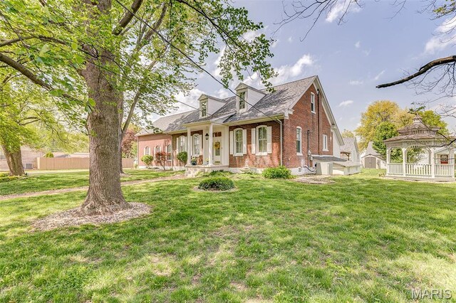 339 E Ml, Millstadt, IL 62260 - view of front of property with a gazebo, brick siding, a front lawn, and covered porch