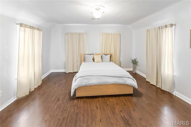 339 E Ml, Millstadt, IL 62260 - bedroom featuring wood finished floors, baseboards, and vaulted ceiling