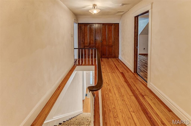 339 E Ml, Millstadt, IL 62260 - hall with light wood-type flooring and an upstairs landing