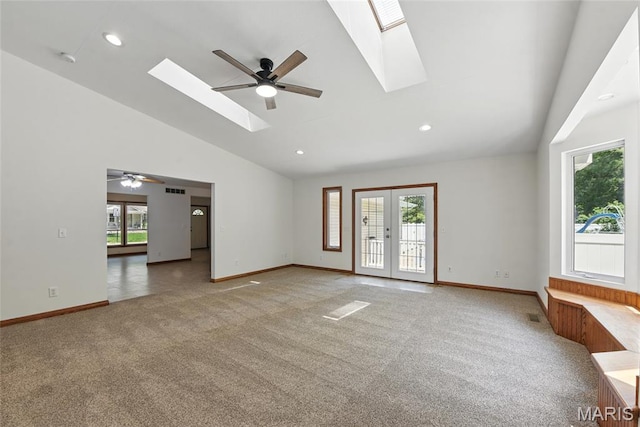 124 Dawn Dr, Washington, MO 63090 - carpeted empty room with a skylight, a ceiling fan, baseboards, recessed lighting, and french doors