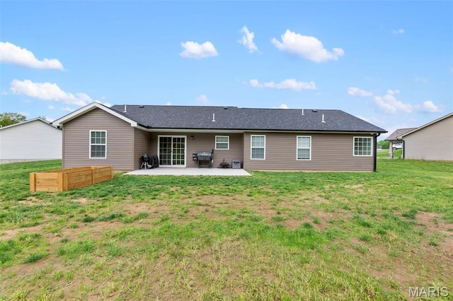 1111 Tulach Ard Ct, Jackson, MO 63755 - back of house featuring a patio, a yard, and a shingled roof