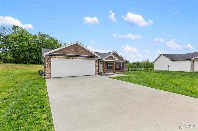 1111 Tulach Ard Ct, Jackson, MO 63755 - view of front facade featuring brick siding, concrete driveway, a front lawn, and a garage