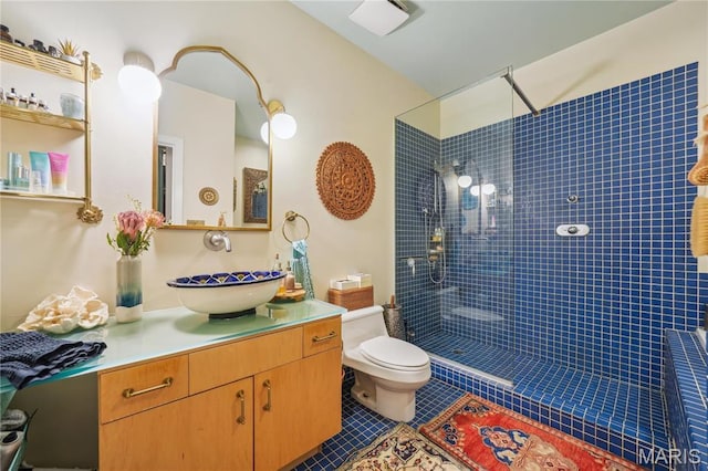 1010 Saint Charles St Unit 701, Saint Louis, MO 63101 - full bathroom featuring tile patterned floors, toilet, vanity, and walk in shower