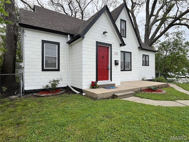 213 W Broadway, Trenton, IL 62293 - view of front facade featuring a shingled roof