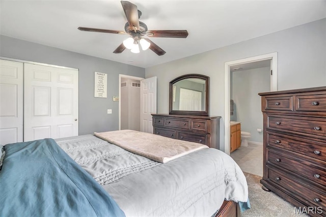 159 Village Circle Dr, Lake St Louis, MO 63367 - bedroom featuring a closet, a ceiling fan, light carpet, and connected bathroom