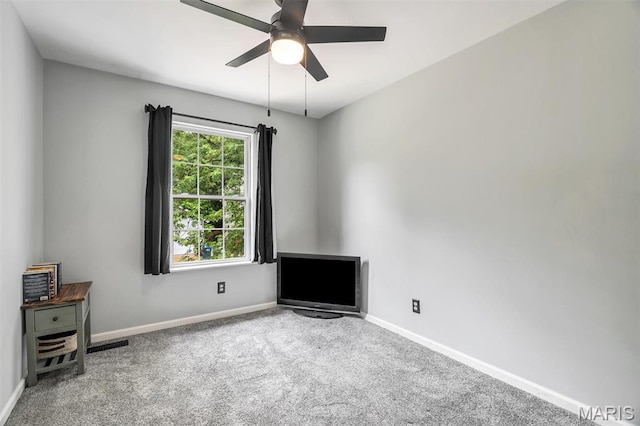 159 Village Circle Dr, Lake St Louis, MO 63367 - carpeted spare room with baseboards and ceiling fan