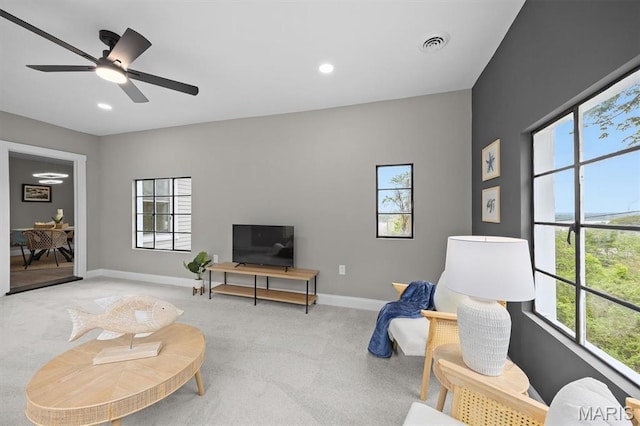 1219 Exchange St, Alton, IL 62002 - living room featuring light colored carpet, baseboards, a ceiling fan, and recessed lighting