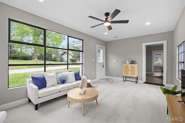 1219 Exchange St, Alton, IL 62002 - living area featuring light colored carpet, ceiling fan, baseboards, and recessed lighting