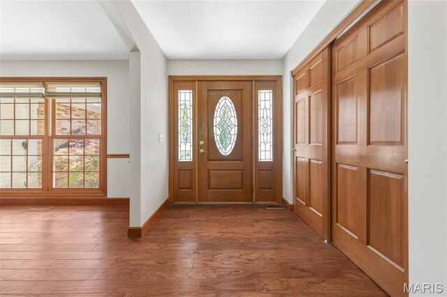 2453 Lone Trail Dr, Foristell, MO 63348 - foyer entrance with baseboards and wood finished floors