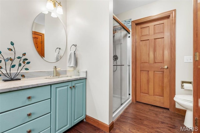 2453 Lone Trail Dr, Foristell, MO 63348 - full bathroom with a stall shower, wood finished floors, vanity, and baseboards
