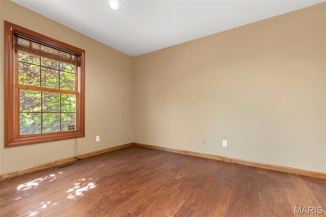 2453 Lone Trail Dr, Foristell, MO 63348 - empty room with wood finished floors, baseboards, and recessed lighting