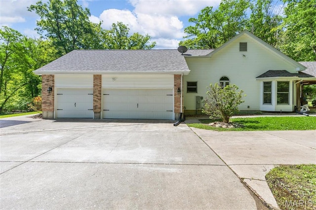 2453 Lone Trail Dr, Foristell, MO 63348 - traditional home featuring concrete driveway, an attached garage, and brick siding