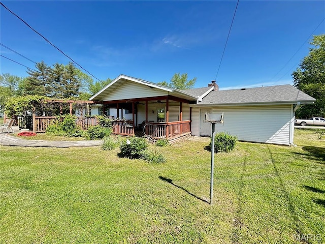 120 E Beth St, Licking, MO 65542 - back of property with a lawn and a porch