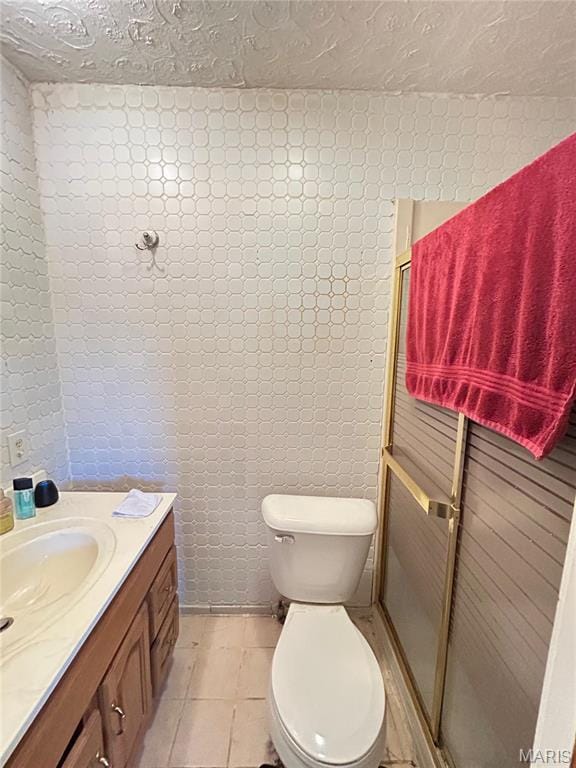 120 E Beth St, Licking, MO 65542 - bathroom with a shower stall, vanity, and toilet