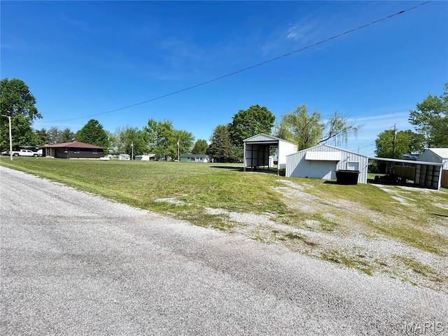 120 E Beth St, Licking, MO 65542 - view of asphalt road with an outbuilding