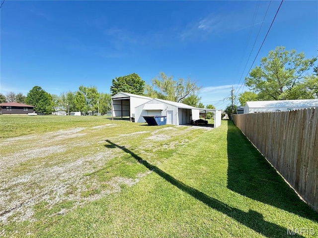 120 E Beth St, Licking, MO 65542 - view of yard featuring a detached garage, an outdoor structure, and a pole building
