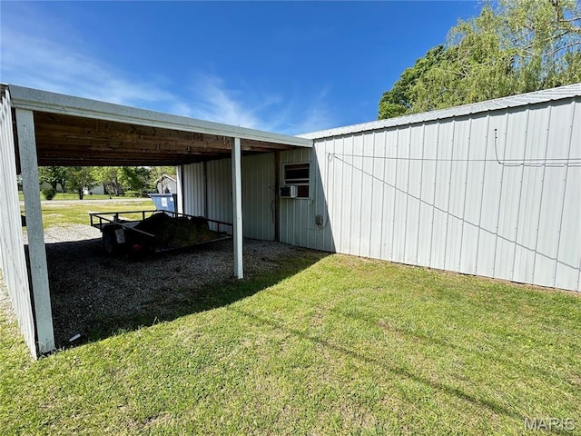 120 E Beth St, Licking, MO 65542 - view of property exterior featuring a yard, an outbuilding, an outdoor structure, and a carport