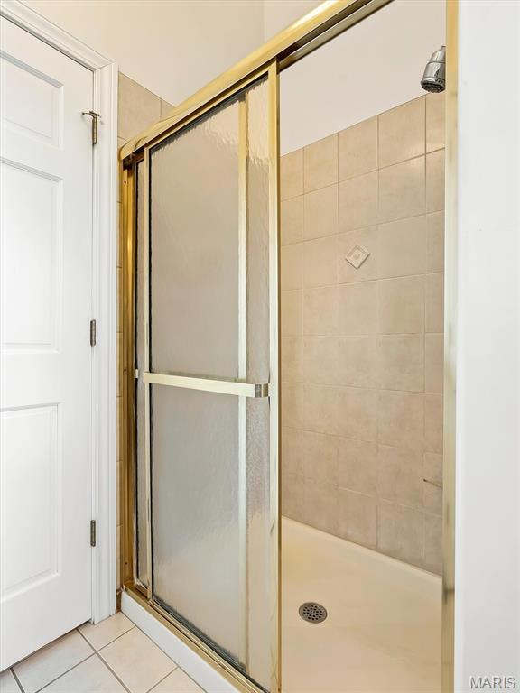 590 Fairway Dr, Union, MO 63084 - bathroom with a shower stall and tile patterned floors