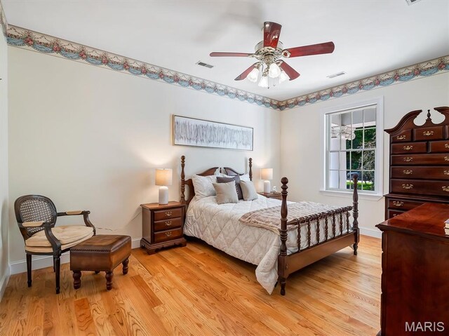 590 Fairway Dr, Union, MO 63084 - bedroom with light wood-type flooring, baseboards, and a ceiling fan