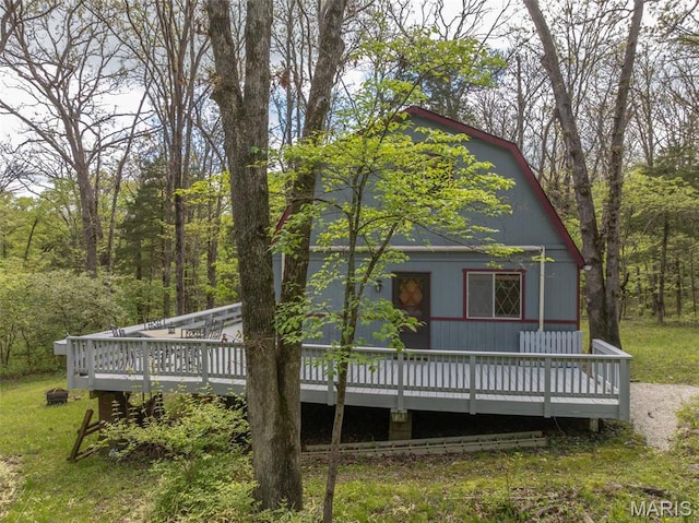87 E Altdorf Dr, Innsbrook, MO 63390 - view of front of house featuring a wooden deck and a view of trees