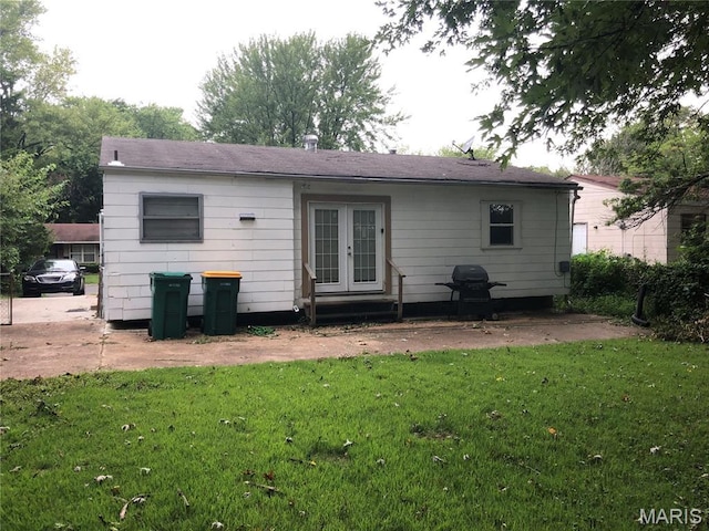 10208 Royal Dr, Saint Louis, MO 63136 - back of house featuring french doors and a yard