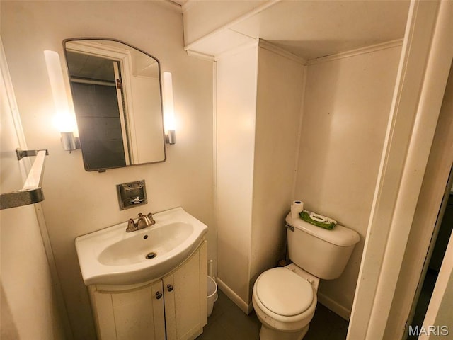 15222 Circle Dr, Gillespie, IL 62033 - half bathroom featuring toilet, vanity, and tile patterned flooring