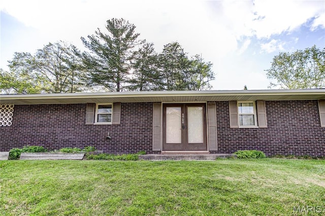 4900 Eiffel Dr, Godfrey, IL 62035 - view of front of house with brick siding and a front lawn