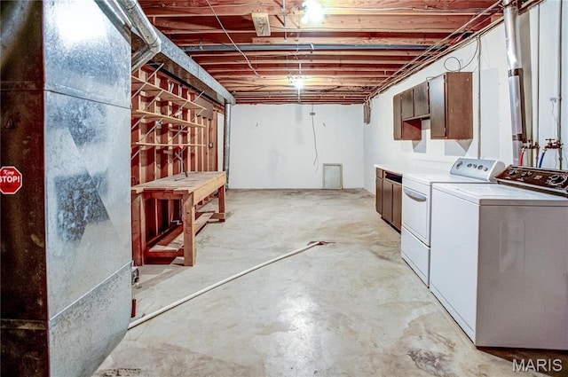 4900 Eiffel Dr, Godfrey, IL 62035 - unfinished below grade area with independent washer and dryer and heating unit