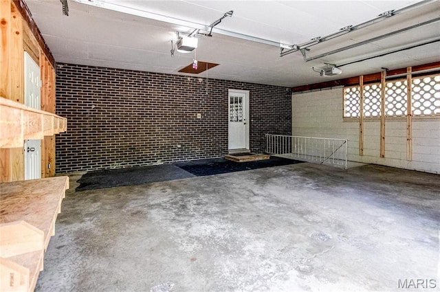 4900 Eiffel Dr, Godfrey, IL 62035 - garage featuring a garage door opener