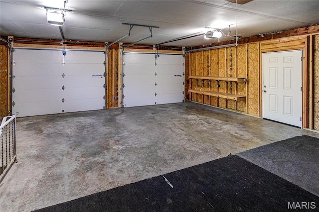 4900 Eiffel Dr, Godfrey, IL 62035 - garage with a garage door opener