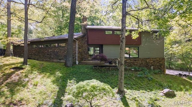 view of front of property featuring a chimney