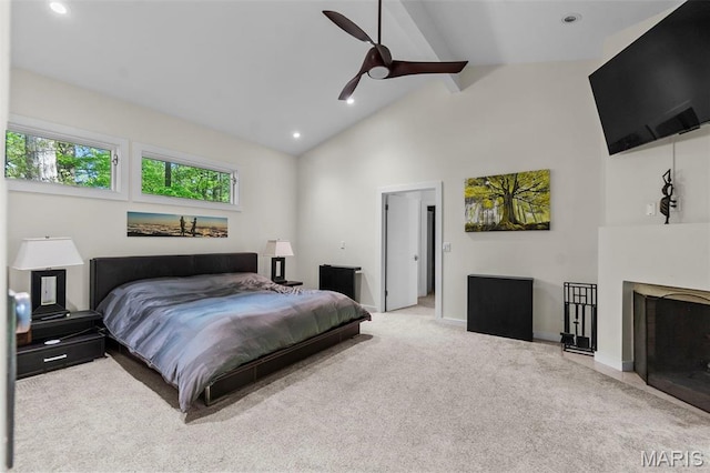 bedroom with high vaulted ceiling, carpet flooring, beamed ceiling, a fireplace, and baseboards