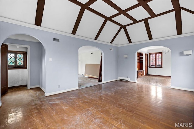 7280 S Roland Blvd, Saint Louis, MO 63121 - unfurnished living room with high vaulted ceiling, baseboards, wood finished floors, beamed ceiling, and arched walkways