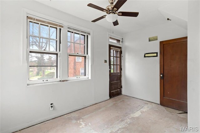 7280 S Roland Blvd, Saint Louis, MO 63121 - entryway with baseboards and a ceiling fan