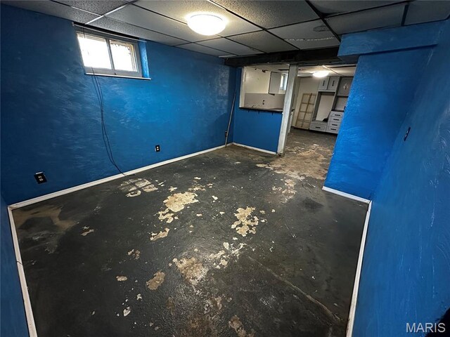 1323 Union Ave, Belleville, IL 62220 - basement featuring baseboards and a drop ceiling