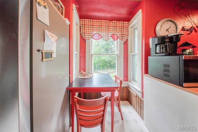 dining room featuring light floors