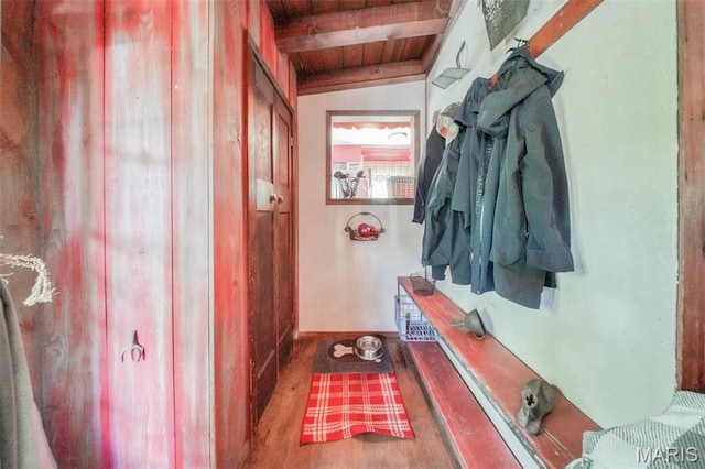 mudroom featuring wooden ceiling, beam ceiling, and wood finished floors