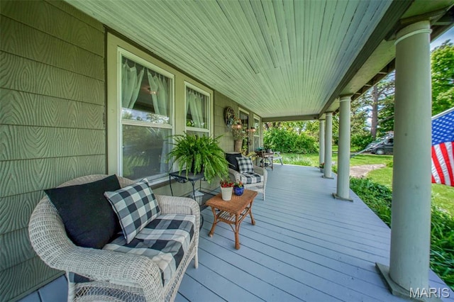 wooden terrace with covered porch