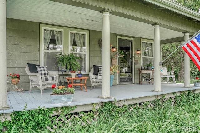 doorway to property with a porch