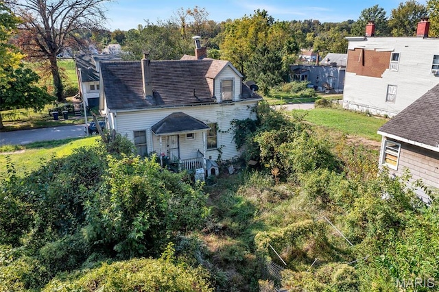 1041 Garth Ave, Saint Louis, MO 63147 - view of front of house featuring a chimney