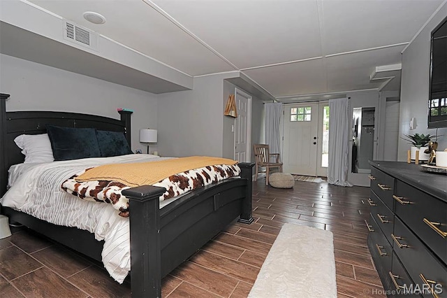 2754 Adeline Ave, Cape Girardeau, MO 63701 - bedroom with dark wood-style floors and access to outside