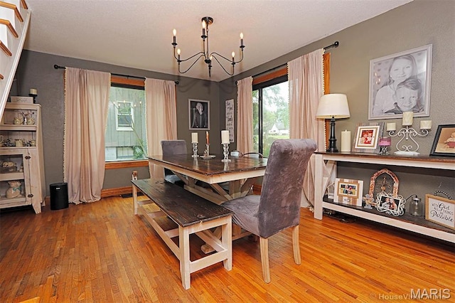 2754 Adeline Ave, Cape Girardeau, MO 63701 - dining room with a chandelier and wood-type flooring