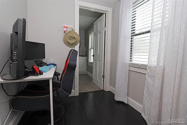 2754 Adeline Ave, Cape Girardeau, MO 63701 - office area featuring dark wood-style floors and baseboards