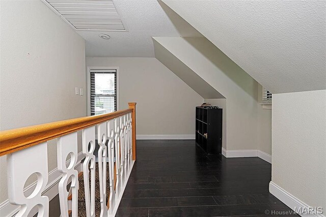 2754 Adeline Ave, Cape Girardeau, MO 63701 - bonus room featuring a textured ceiling, dark wood finished floors, and lofted ceiling