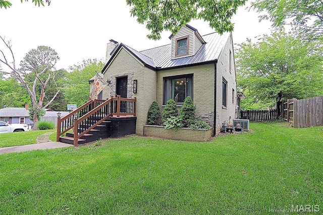 2754 Adeline Ave, Cape Girardeau, MO 63701 - view of front of home featuring a chimney and a metal roof